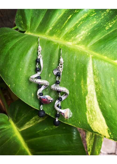 LS4
Earring
Silver coiled serpent intertwined with black lava beads with silver knotting
2022
Availble